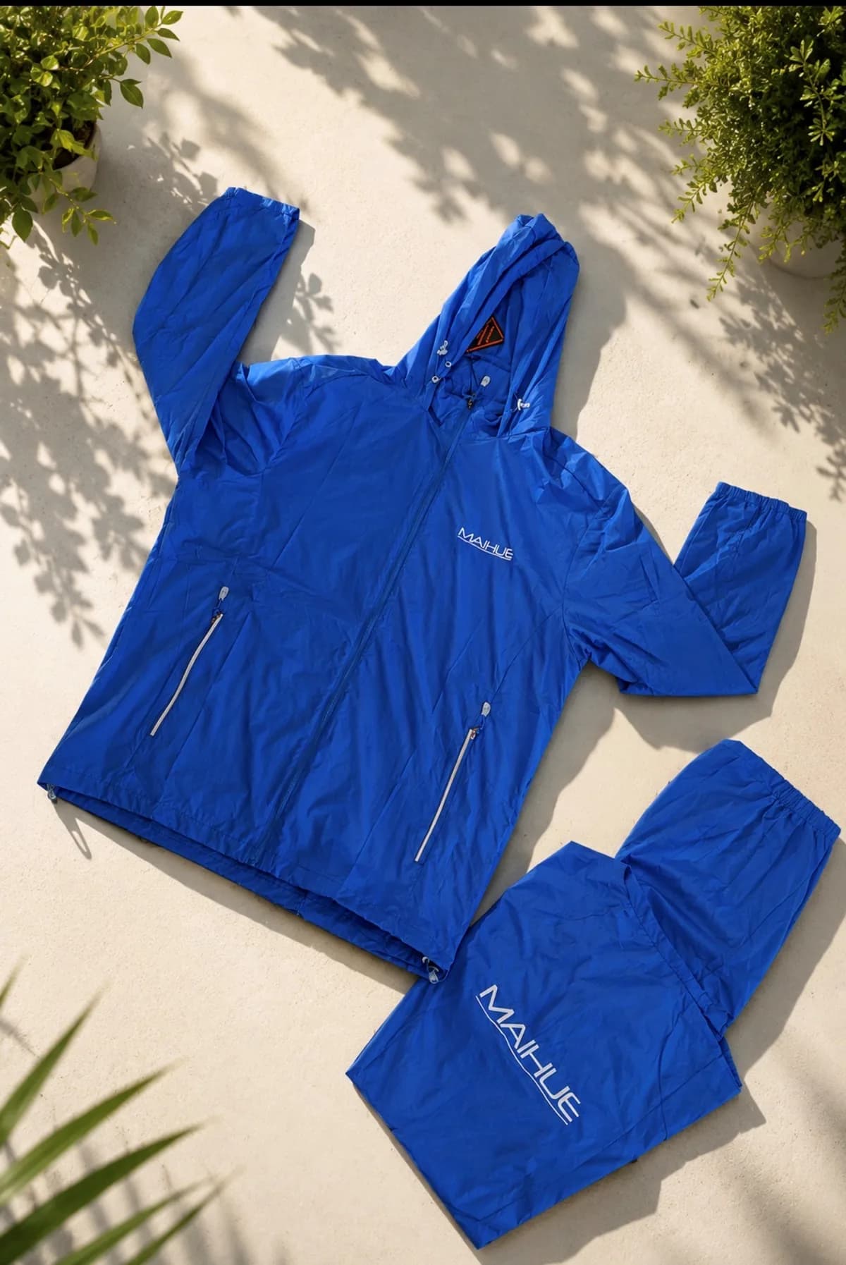 Cortavientos, Pantalón cortaviento para Maihue — Bordado